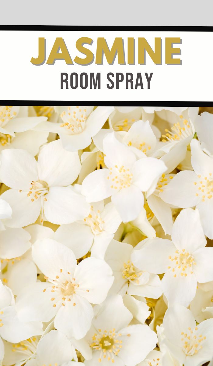 The label for Jasmine Room Spray showcases a background of white jasmine flowers with yellow centers, reflecting the essence of a homemade Jasmine room spray. Bold gold and black text elegantly sits atop a white strip, completing the design.