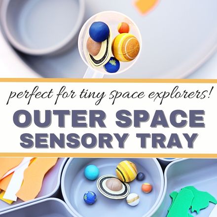 Toy planets and stars in trays are labeled Outer Space Sensory Tray, making space activities perfect for tiny explorers! The setup includes colorful cutouts and miniature solar system models on display.
