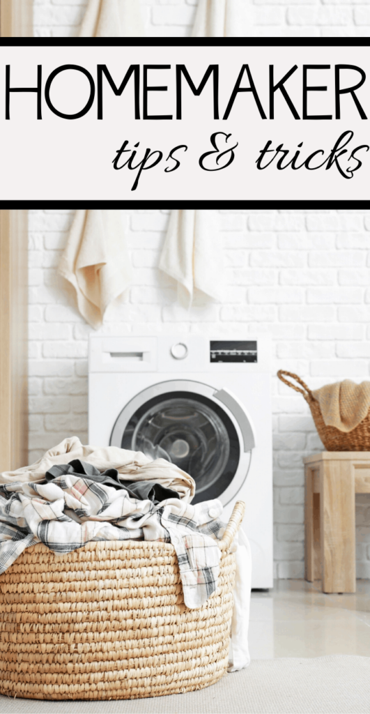 Laundry room with a wicker basket filled with clothes in front of a washing machine. Text at the top reads Homemaker tips & tricks. A white brick wall and hanging towels are in the background.