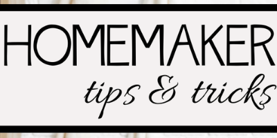 A rectangular sign with a white background and black border features the text HOMEMAKER in bold letters and tips & tricks in a cursive font.