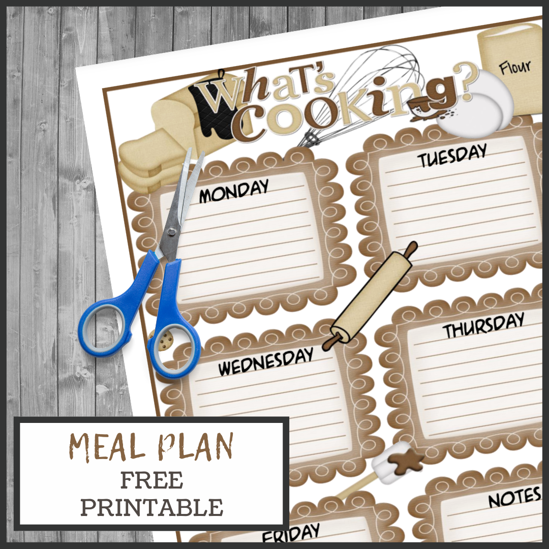 A free printable menu planner titled Whats Cooking? features sections for each weekday, adorned with cooking utensils and ingredients. Beside it, vibrant blue-handled scissors rest on a wooden surface, ready to help you organize your meals efficiently.